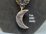 Bronze and black polymer moon